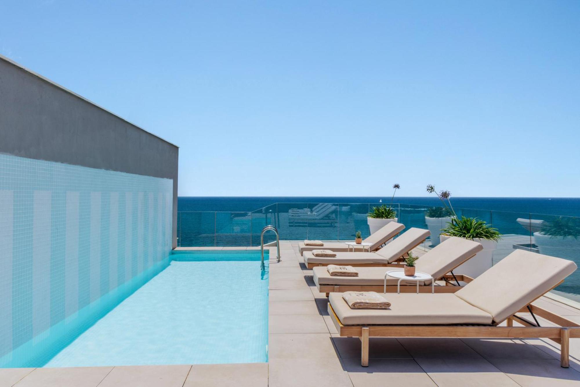 미 시체스 테르라마르 외부 사진 Rooftop pool at the Hotel